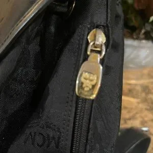 MCM | Bags | Mcm Leather Trim And Nylon Backpack Euc | Poshmark display picture 1